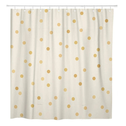 Beige duschdraperi med guldfärgade prickar