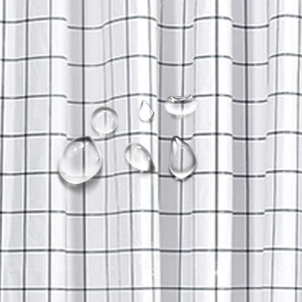 Minimalistiskt duschdraperi med svart rutnät