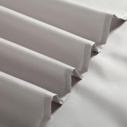 Enfärgat ljusgrått duschdraperi i tyg