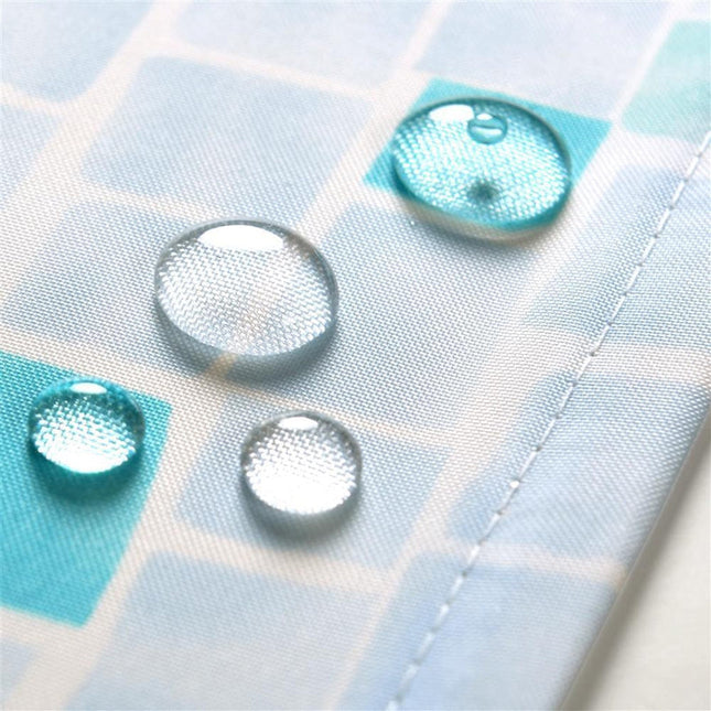 Duschdraperi med marint mosaikmönster