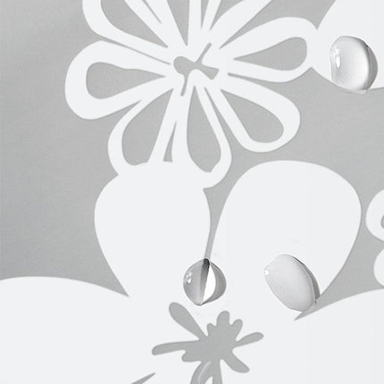 Halvtransparent duschdraperi med vita blommor