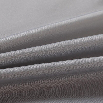 Enfärgat grått duschdraperi i slitstarkt tyg