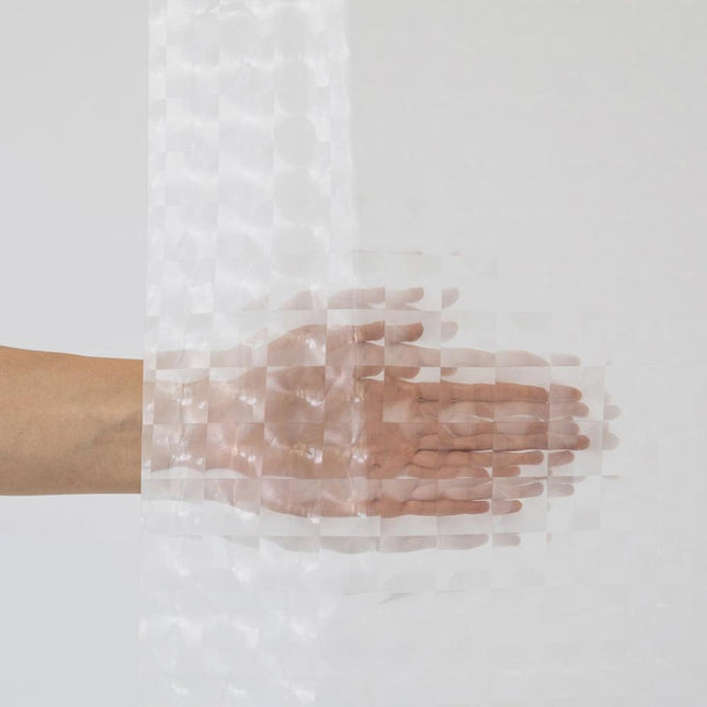 Transparent duschdraperi med våffelmönster